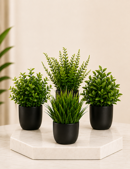 Lot de 4 plantes artificielles réalistes Haruki en pots noirs, décoration intérieure moderne et naturelle.
